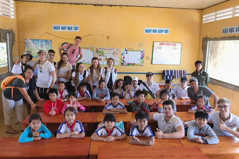 Students join community service from Vietnam school trip