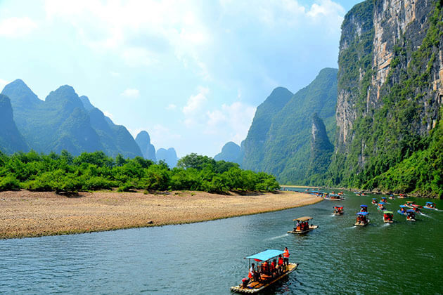 Kayaking on the emerald- green Li River, Guilin