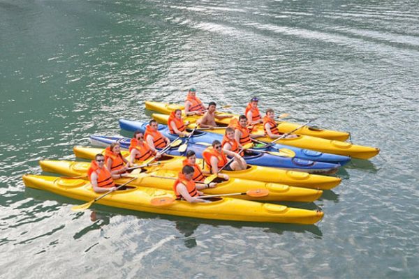 Students kayaking in Halong Bay - Vietnam school trip