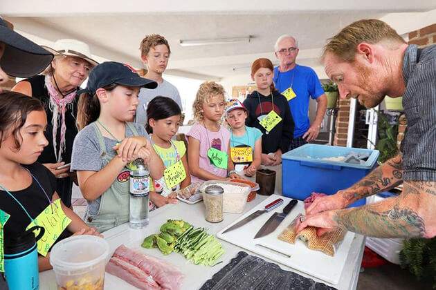 Students learn to cook sushi in Japan School Trip