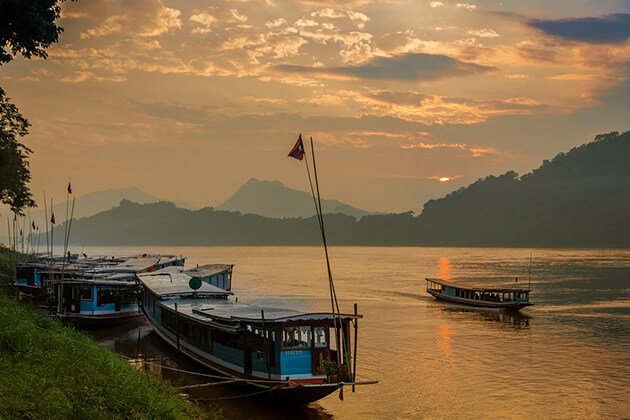 Stunning sunset on the Mekong River - Laos school trips