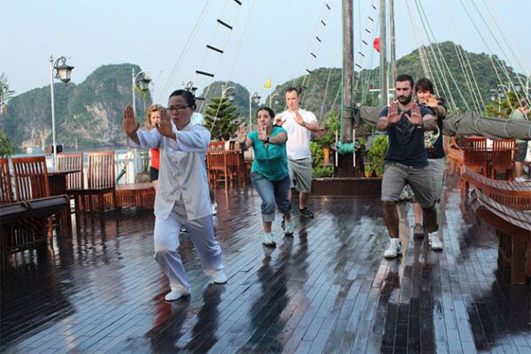 Tai Chi exercises in morning Halong cruise