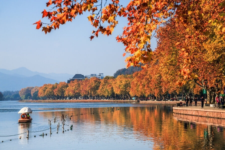 Walking along West Lake in Hangzhou on an educational tour