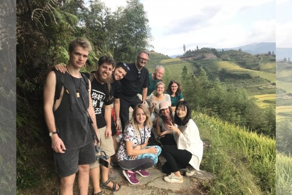 connecting with minority villagers at Longsheng terraces on a meaningful educational trip in China
