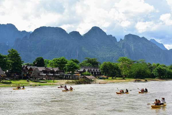 kayaking on nam song river - Laos school trips