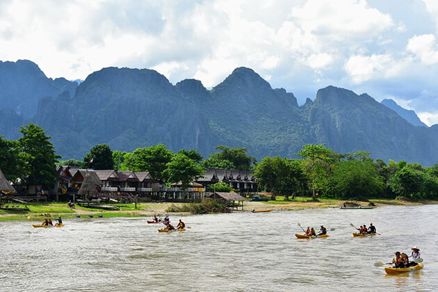 kayaking on nam song river - Laos school trips