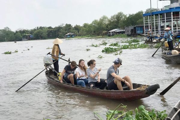 students boat around Mekong Delta - Vietnam school trips